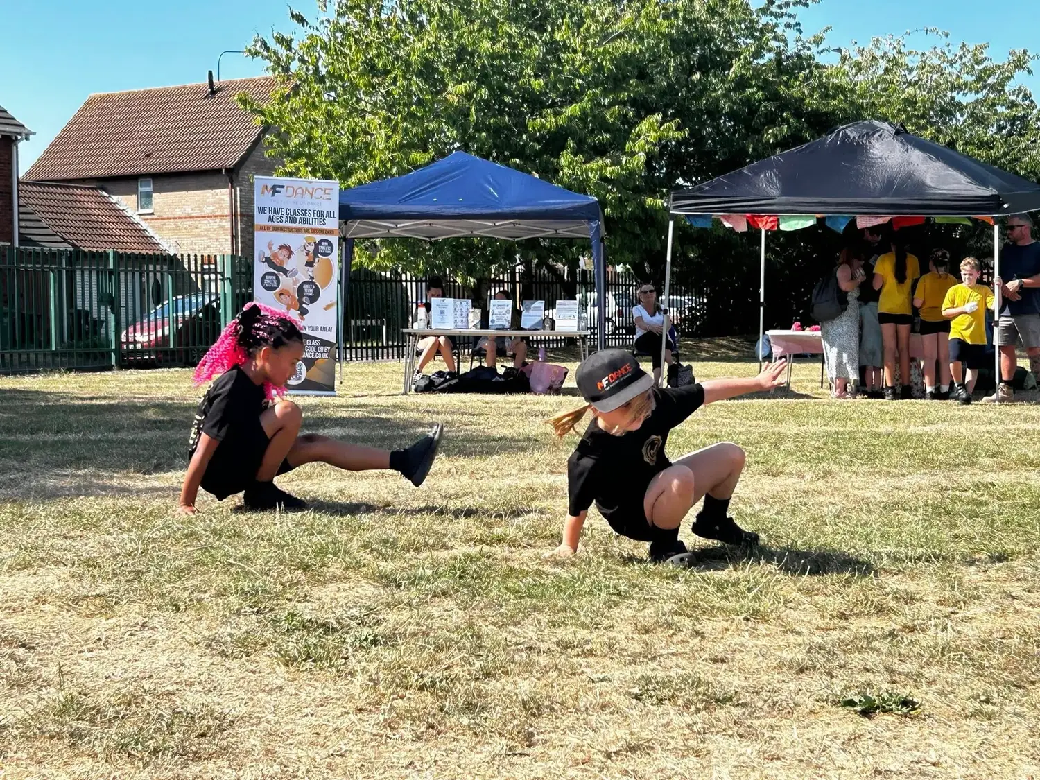 MF Dance children practising street dance at an outdoor community event